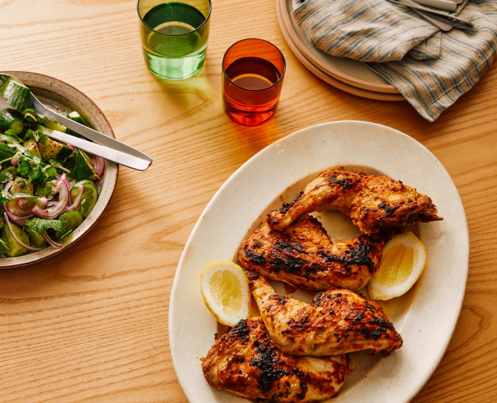 Yoghurt roast chicken and salad on a table