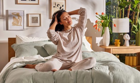 A woman in comfortable clothing gets prepared for a great night’s sleep on a Koala bed