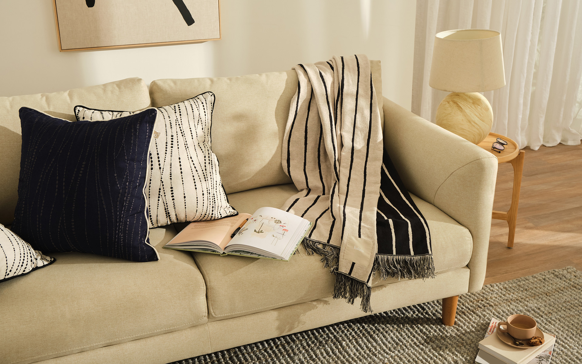 Koala’s cushions and throws adds a sophisticated touch to a coastal Hamptons style living room 