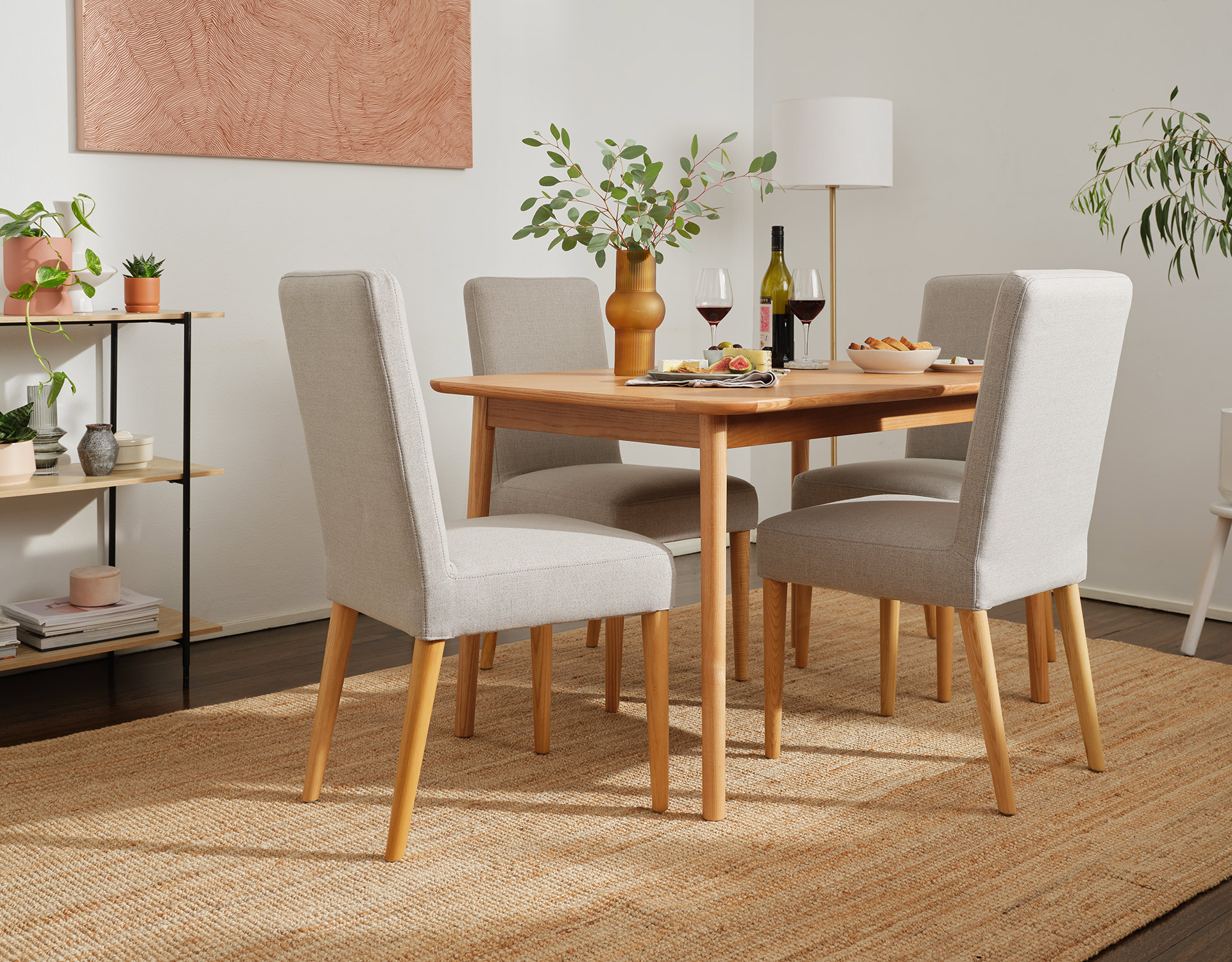 The Koala Serenity Dining Table in a dining room with floor rug and dining chairs