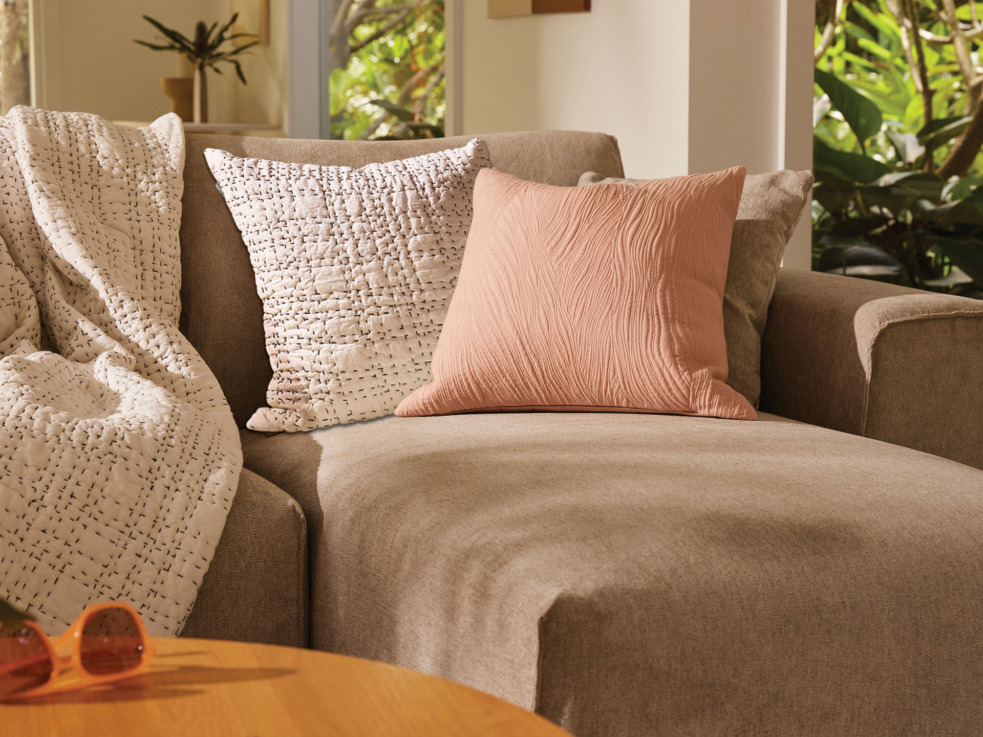 A range of Koala cushions and a throw on a Koala sofa