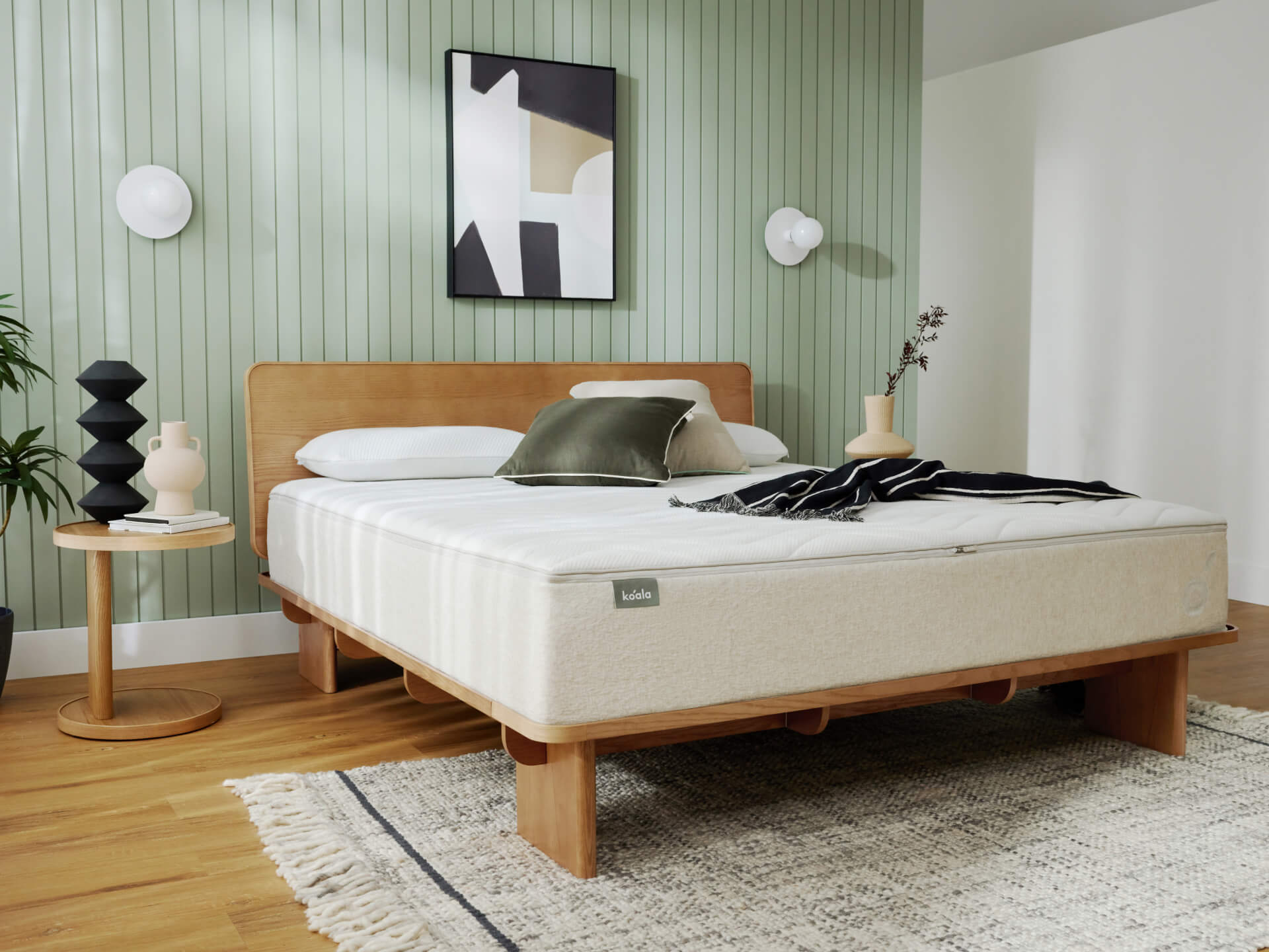A Koala mattress sits on the Kirribilli bed base in a contemporary-styled bedroom.