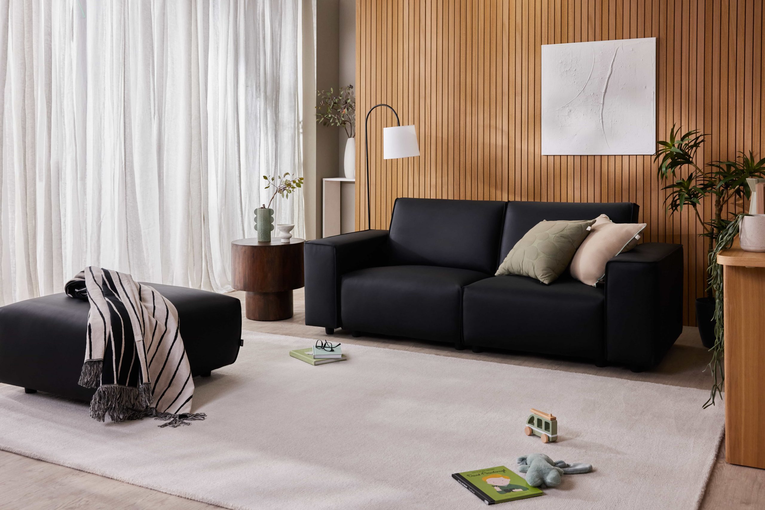 The Koala Modern UnReal Leather Sofa in Black Wood